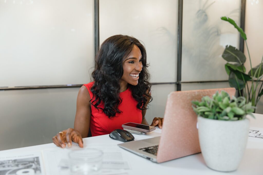 Happy Small Business Owner using Clickgrow.ai the simple Social Media Automation Tool.